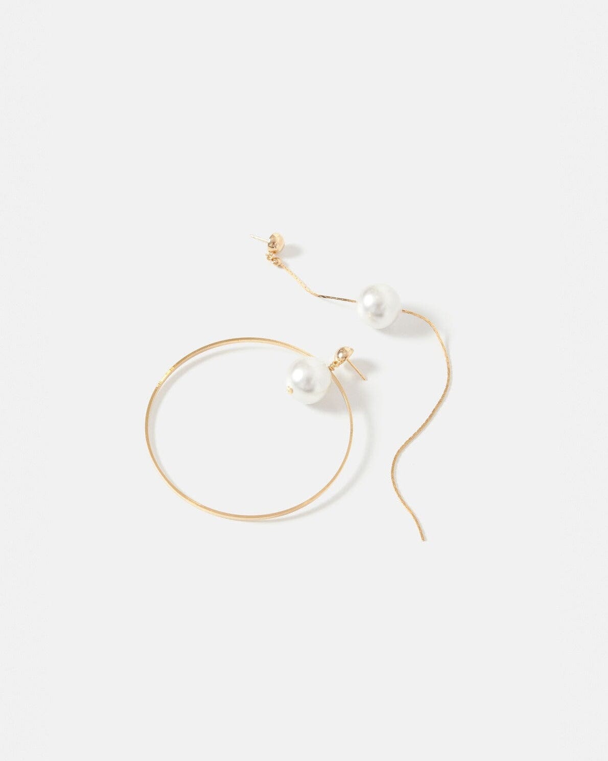 Emilia perla asymmetrical Earrings La Morenita 