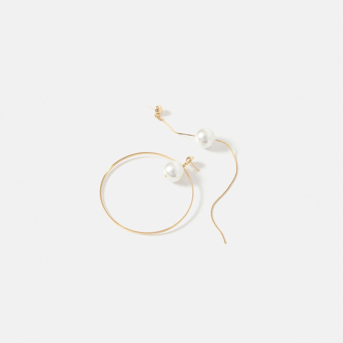 Emilia perla asymmetrical Earrings La Morenita 