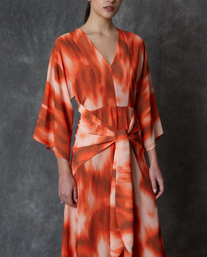 Vestido midi estampado en tonos coral con lazada frontal Dresses Roberto Torretta 