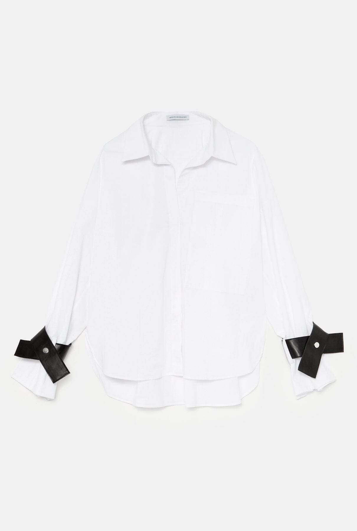 Camisa oversize blanca con puños de cuero negro Shirts & blouses Miguel Marinero 